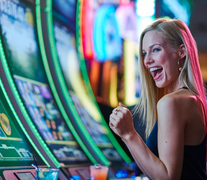 Woman playing slot machines